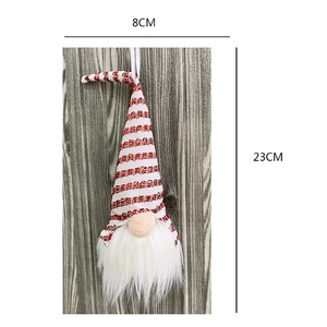 Detailed size view of red and white sequined Christmas gnome plush hanging ornament