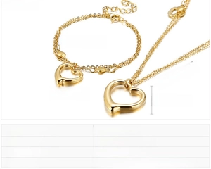 Detailed specs for gold stainless steel heart pendant necklace and bracelet set