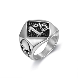 Retro stainless steel biker ring with 1%er engraving and skull design on white background