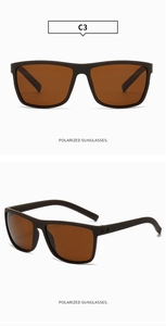 Detail of polarized brown lenses and carbon fiber texture frame on sports sunglasses