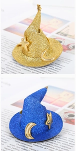 Detail of glitter witch hats in gold and blue with 3D metallic stars and moon charms