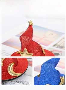 Macro detail of sequined witch hats with gold stars and moon patterns for Halloween decor