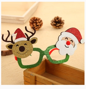 Detalle de montura de gafas navideñas con purpurina, Papá Noel y diseño de reno