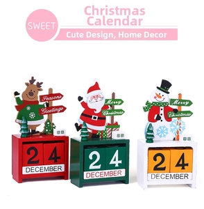 Detailed view of wooden Christmas calendars featuring Santa, Reindeer and Snowman designs