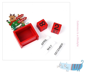 Detail view of wooden Christmas countdown calendar with blocks and reindeer decor