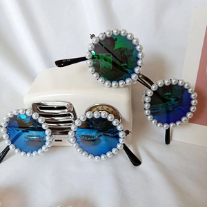 Kids round sunglasses with colorful lenses and pearl embellished frames in blue and green