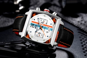 Macro detail of square automatic watch dial with racing stripes and black leather strap