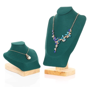 Dark green velvet necklace display stands with natural wooden bases in two sizes
