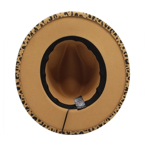 Detail of wool fedora interior showing 65% cotton blend label and leopard print brim
