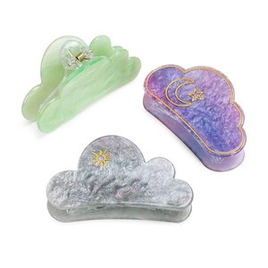 Cloud-shaped marble texture hair claws set with celestial moon and star patterns