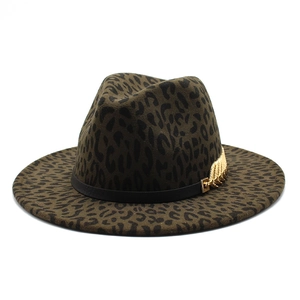 Leopard print wide brim fedora hat with gold feather buckle and black ribbon trim