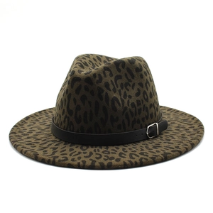 Leopard print wool fedora hat with black leather band and silver buckle on white background