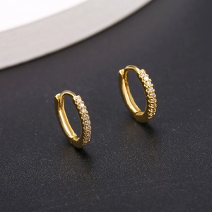 Elegant gold-plated hoop earrings featuring micro-pave cubic zirconia on gray background