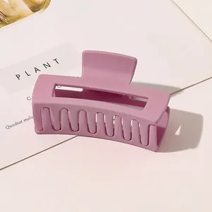 Detail of large matte taro purple hair claw clip with rectangle hollow design
