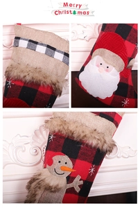 Close-up of red and black buffalo plaid Christmas stockings with faux fur trim details