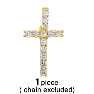 Détail d'un pendentif croix doré orné de zircons avec attache pour collier, sans chaîne