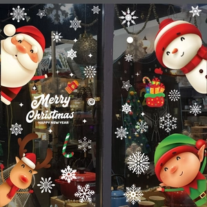 Close-up of festive Santa Claus, reindeer, and snowflake static window cling set