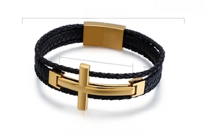 Close-up of men's leather bracelet with gold cross pendant and detailed measurements