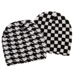 Set of two black and white knit beanies featuring houndstooth and checkerboard patterns