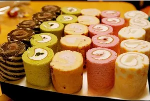 Detailed view of assorted silicone Swiss roll cake mats showing various textures and colors
