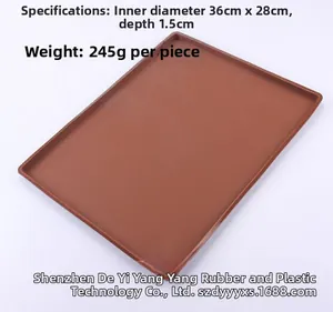 Brown silicone baking mat with 36x28cm inner dimensions and 1.5cm shallow edge