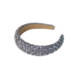 Elegant wide silver headband with sparkling crystals and beige fabric lining for women