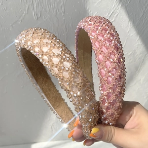 Elegant crystal beaded headbands in champagne and pink colors with soft velvet lining