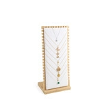 L-shaped wooden jewelry display stand with white panel and hooks for gold necklaces