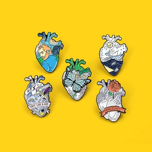 Set of five heart-shaped enamel pins featuring Van Gogh style art and butterfly designs