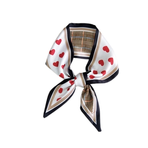 Narrow silk scarf for women featuring black and white heart and brown plaid pattern