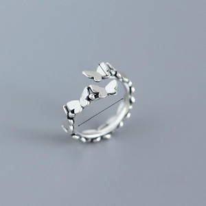 Detail of adjustable S925 silver beaded ring with three 5.3mm butterfly charms