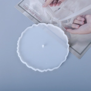 Detailed view of translucent wavy silicone mold for DIY resin coasters and tiered trays