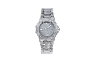 Detail of silver women's watch with iced-out crystals and calendar window on dial