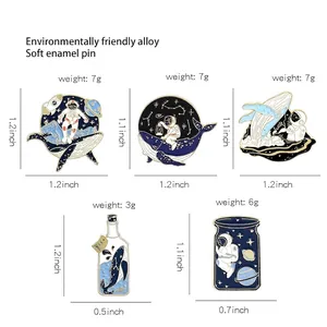 Cartoon whale and astronaut enamel pins set with sizes and weights on white background