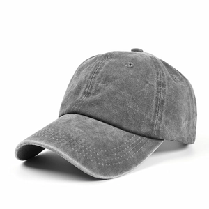 Close-up of a dark grey washed cotton baseball cap featuring reinforced stitching details