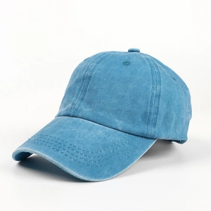 Detail of lake blue washed cotton baseball cap showing stitching and ventilation eyelets