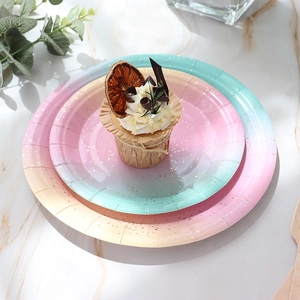 Rainbow gradient disposable paper plates with gold polka dots for party table decoration