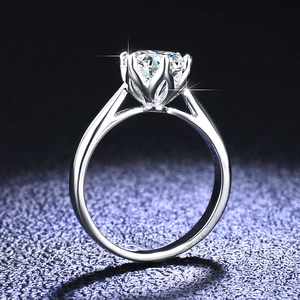 Side view of classic six-prong moissanite ring showing brilliant fire on S925 silver band