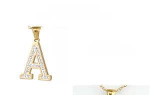 Macro shot of 18k gold plated 304 stainless steel necklace with diamond letter A pendant