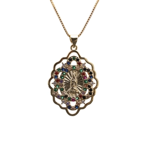Detailed close-up of Virgin Mary gold pendant with colorful zircon stones on white background