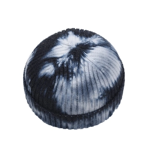 Detailed view of the tie-dye pattern and ribbed texture on this knit docker cap