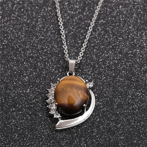 Silver necklace featuring oval tiger eye stone pendant with sparkling rhinestones