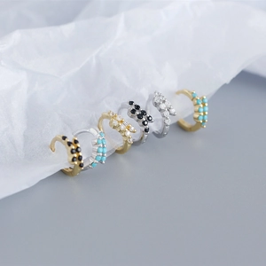 Detailed close-up of S925 silver hoop earrings with micro-set multi-color zirconia
