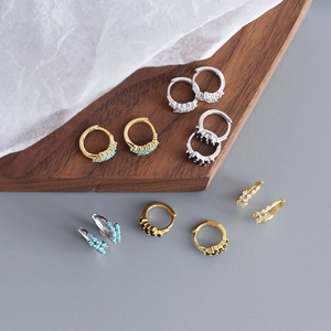 Elegant S925 sterling silver hoop earrings with zircon stones in gold and silver finishes