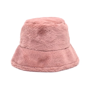 Detail view of the pink faux rabbit fur texture on a warm winter bucket hat for women