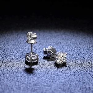 Detailed view of s925 silver four-prong stud earrings with round brilliant-cut moissanite