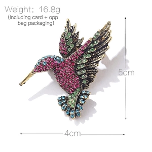 Vintage hummingbird brooch pin with colorful rhinestones in gold tone metal, 5cm height