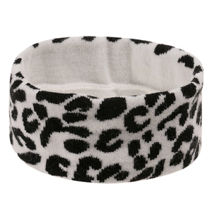 Detailed view of elastic leopard print knitted headband with soft fuzzy texture