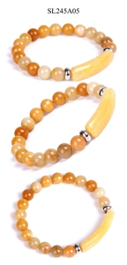 Detail view of natural tiger eye and aventurine stone bracelet with steel spacers