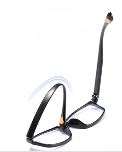 Macro shot of flexible black TR material eyewear frames showing extreme bending durability